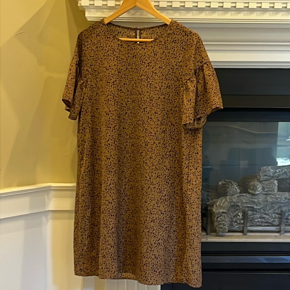 Tan knee length shift dress with black dots